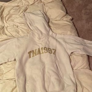 Used White TNA 1997 Sweater. has a few stains but can easily be removed!!